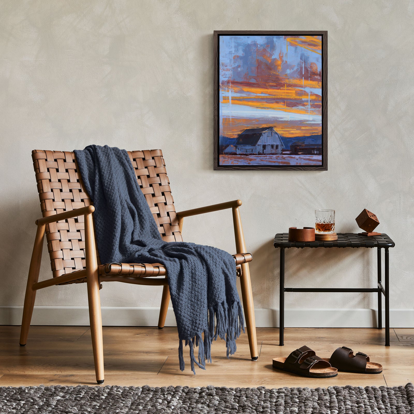 "The Snow Crunched Underfoot" by James Ayers, a 20x16” rural winter landscape painting featuring a barn under dramatic clouds and a glowing sunset.